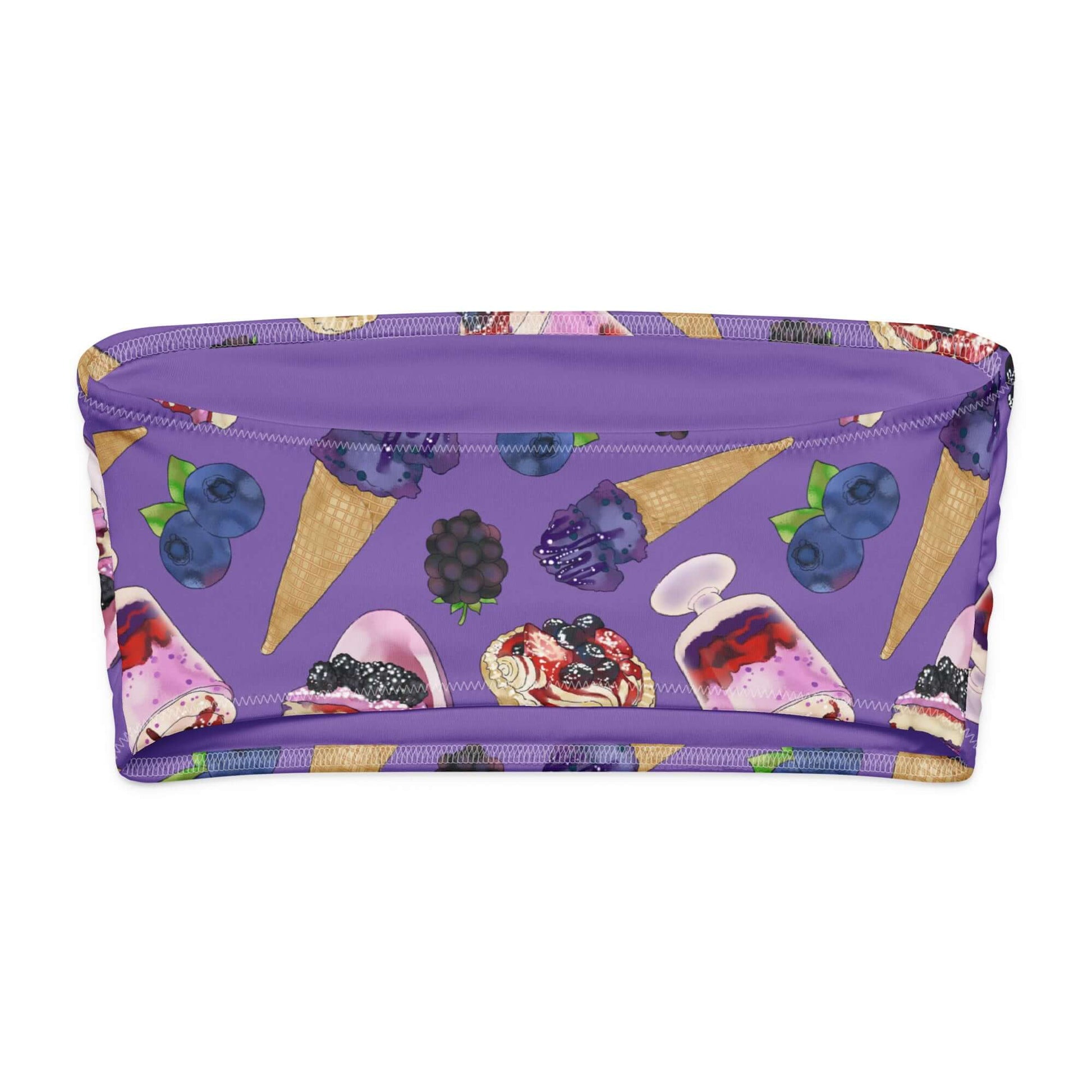 Berry bandeau bikini top with colorful fruit and ice cream print on a purple background.