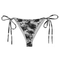 Stylish Enchanted Rose String Bikini Bottom with adjustable ties, perfect for sunbathing by the pool this summer.