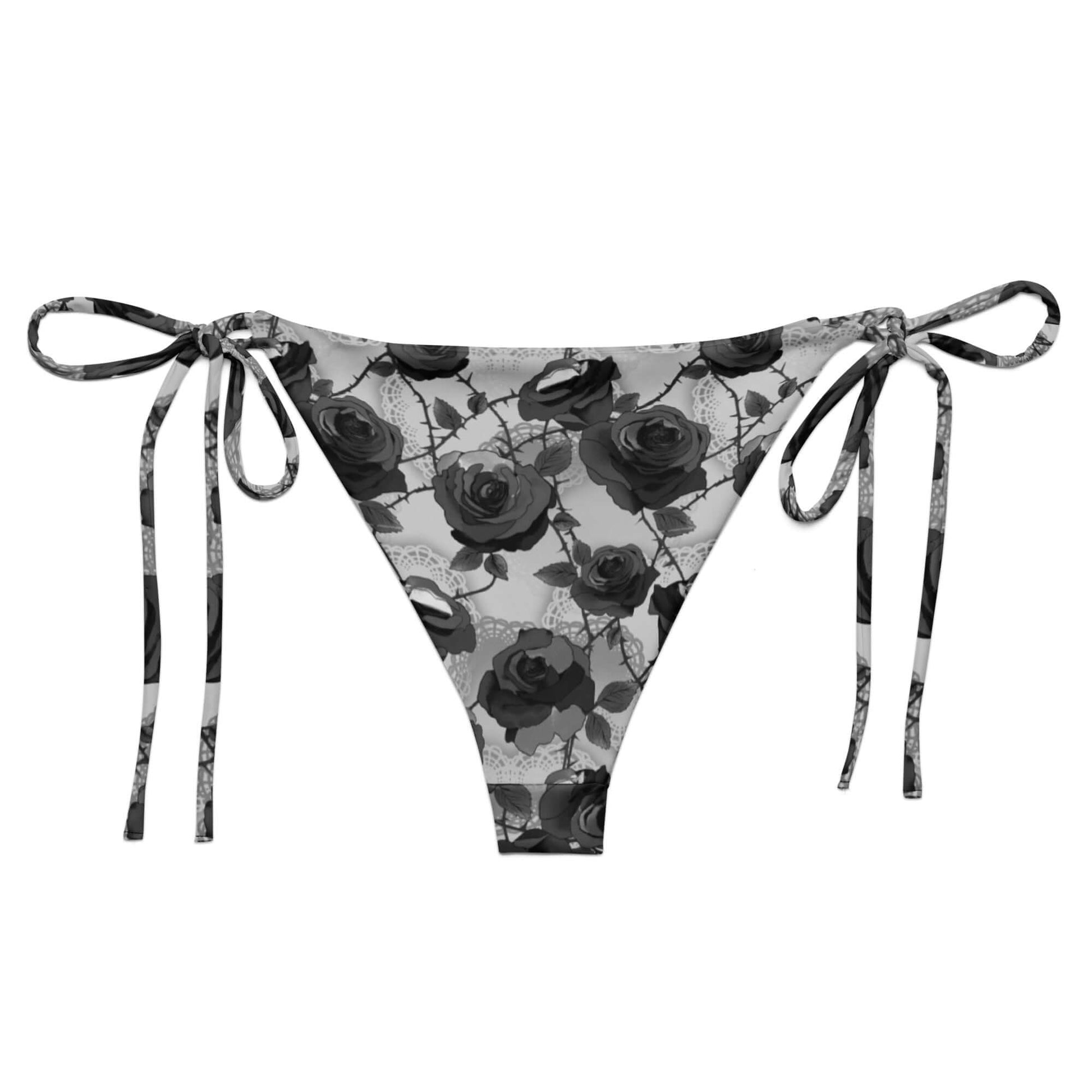 Stylish Enchanted Rose String Bikini Bottom with adjustable ties, perfect for sunbathing by the pool this summer.