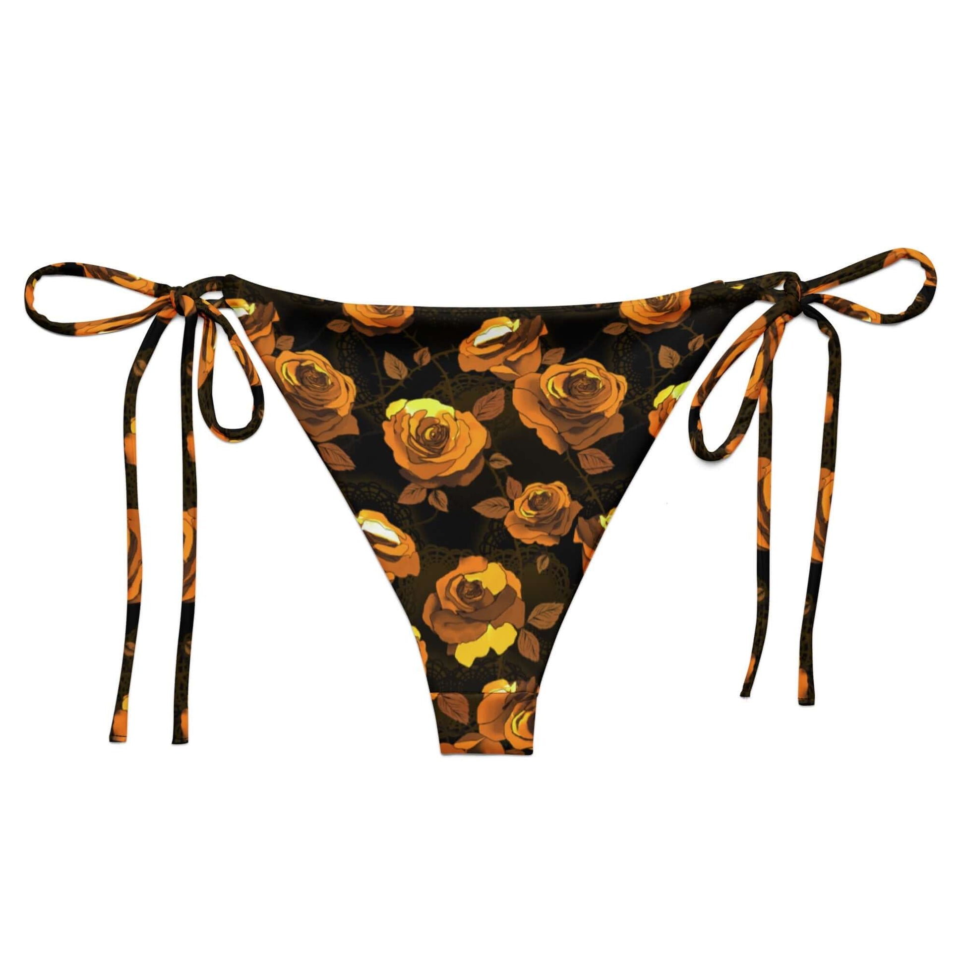 Enchanted Rose String Bikini Bottom features a floral design, perfect for sunbathing by the pool in style.