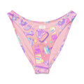 Glitter Gains V-cut bikini bottom in pastel pink with fun animated prints, perfect for sunny beach days.