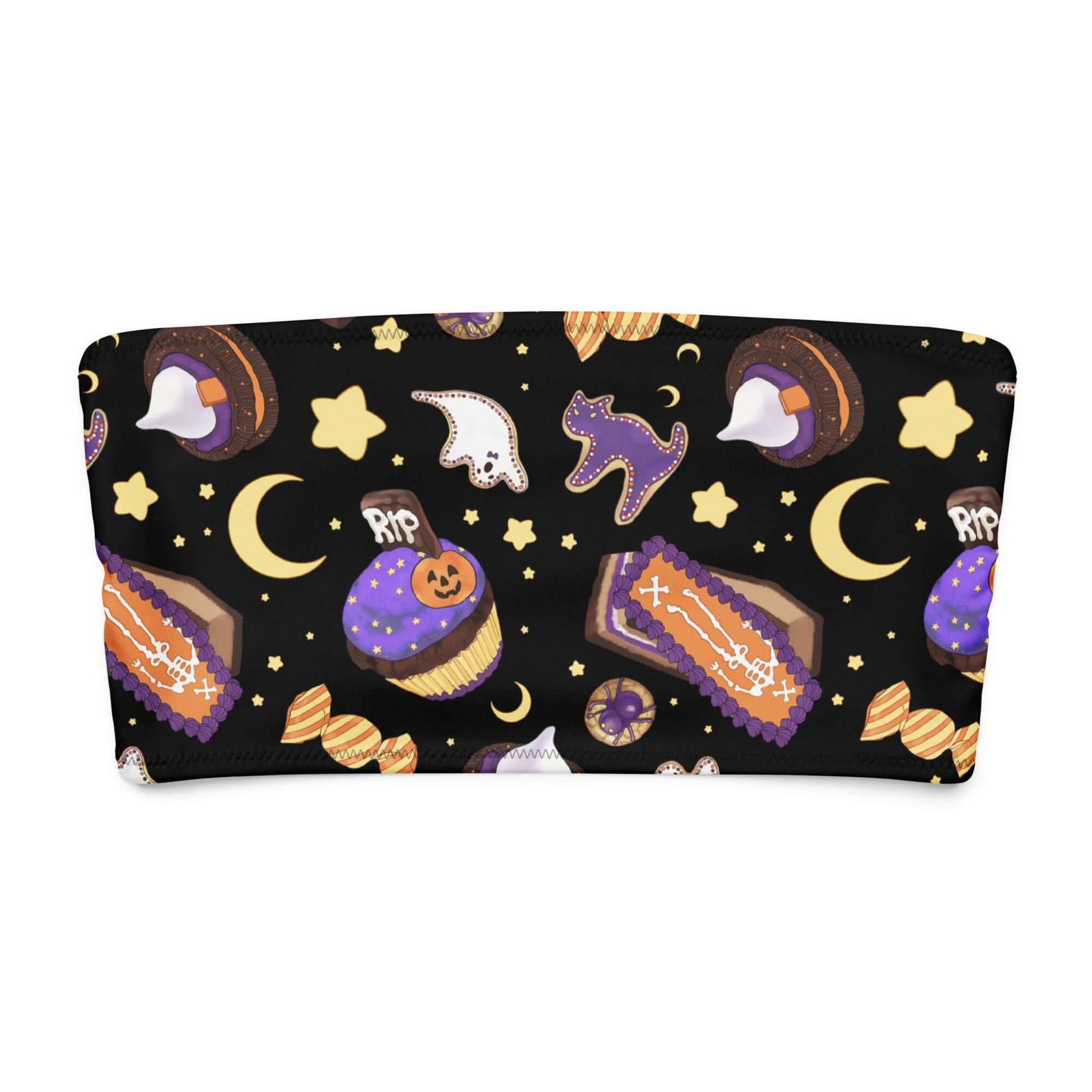 Halloween-themed bandeau bikini top featuring spooky treats like cupcakes, ghosts, moons, and coffins on a black background.