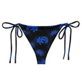 Stylish Higanbana String Bikini Bottom featuring blue floral design, perfect for sunbathing by the pool this summer.