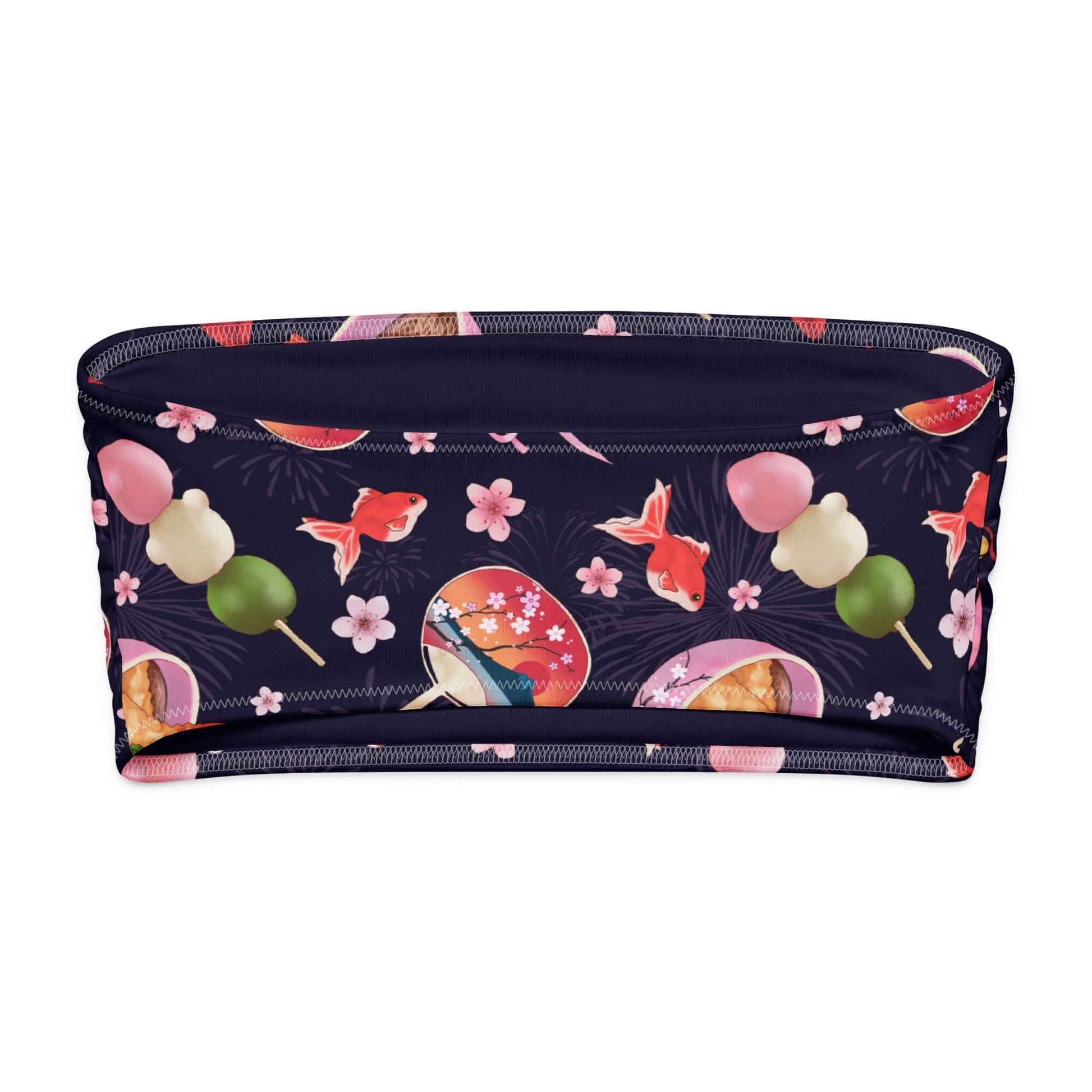 Matsuri bandeau bikini top featuring colorful Japanese-themed patterns with food and flowers.