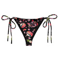 Matsuri String Bikini Bottom features vibrant floral prints, perfect for sunbathing by the pool this summer.