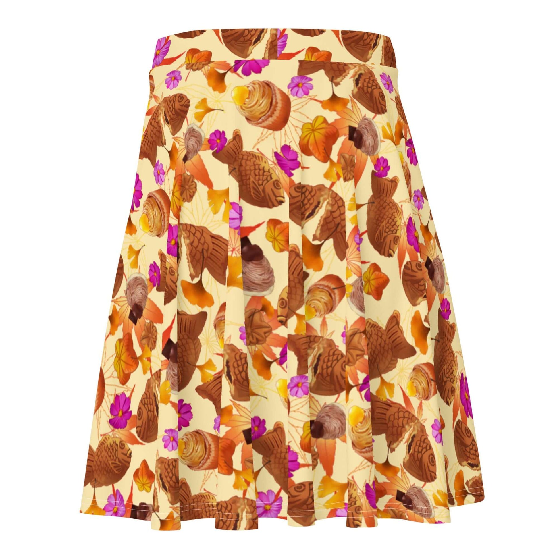 Cozy and cute Momiji Skater Skirt featuring a vibrant fish and flower print, perfect for warmer days.
