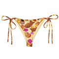 Momiji String Bikini Bottom featuring a vibrant pattern, perfect for poolside lounging this summer. UPF 50+ protection.