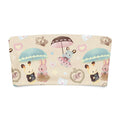 Cute bandeau bikini top featuring adorable bunnies under umbrellas in pastel colors.