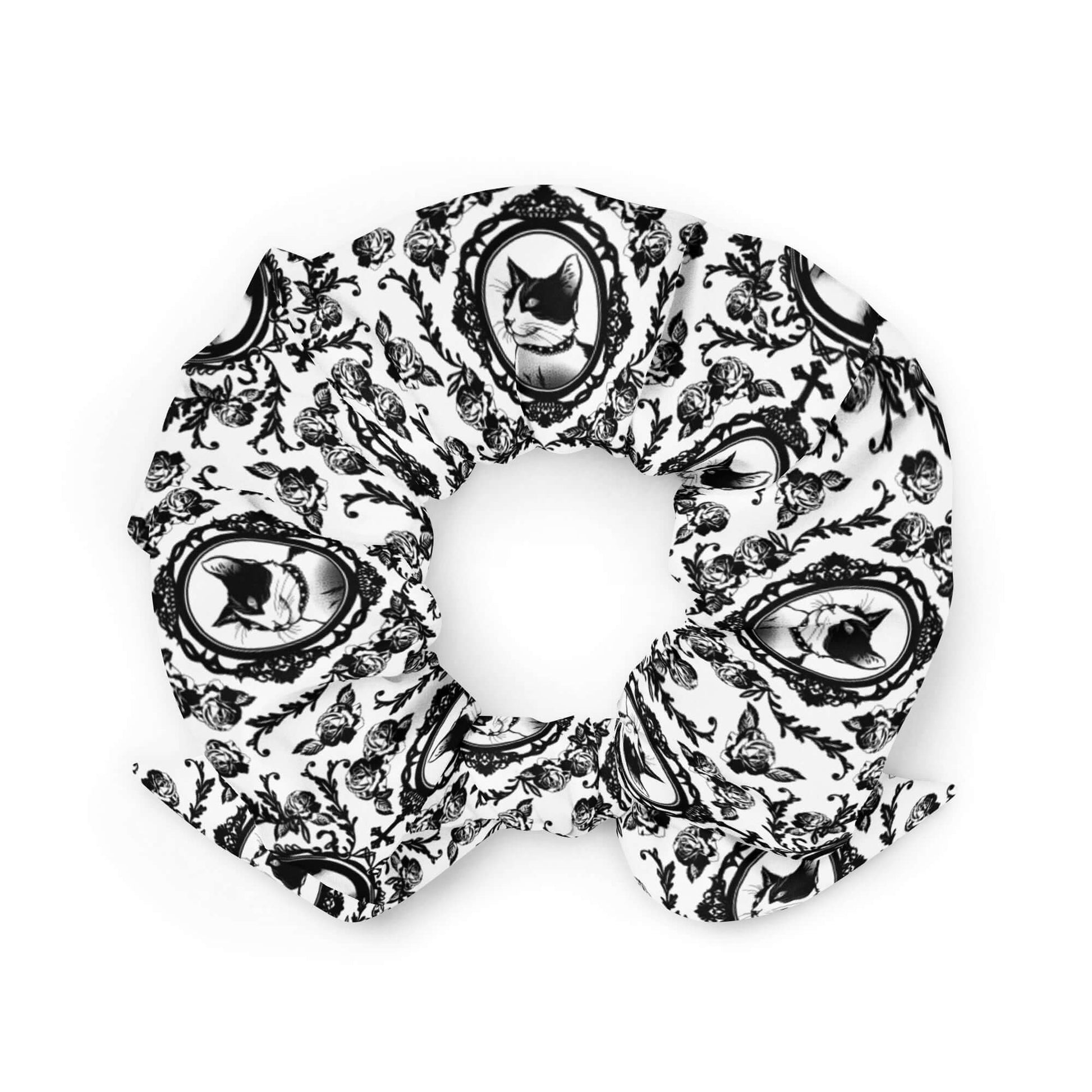 Elegant Queen's Beloved Kitty Scrunchie featuring a chic black and white cat design, perfect for stylish hair management.