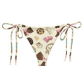 Royal Cookie String Bikini Bottom featuring a fun cookie print, perfect for sunbathing by the pool this summer.