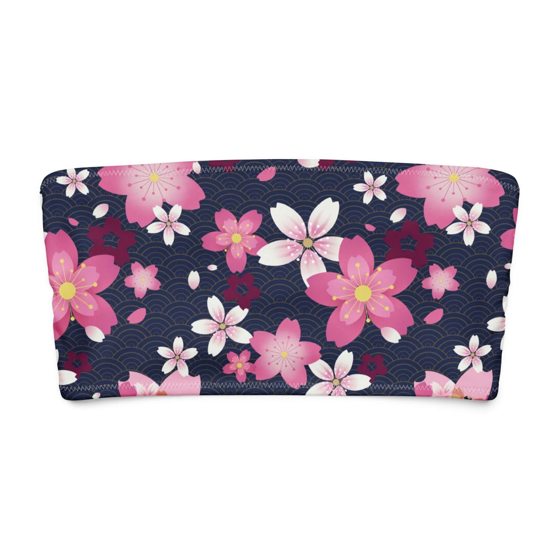 Sakura bandeau bikini top featuring pink cherry blossoms on a navy background, perfect for beachwear and summer fun.