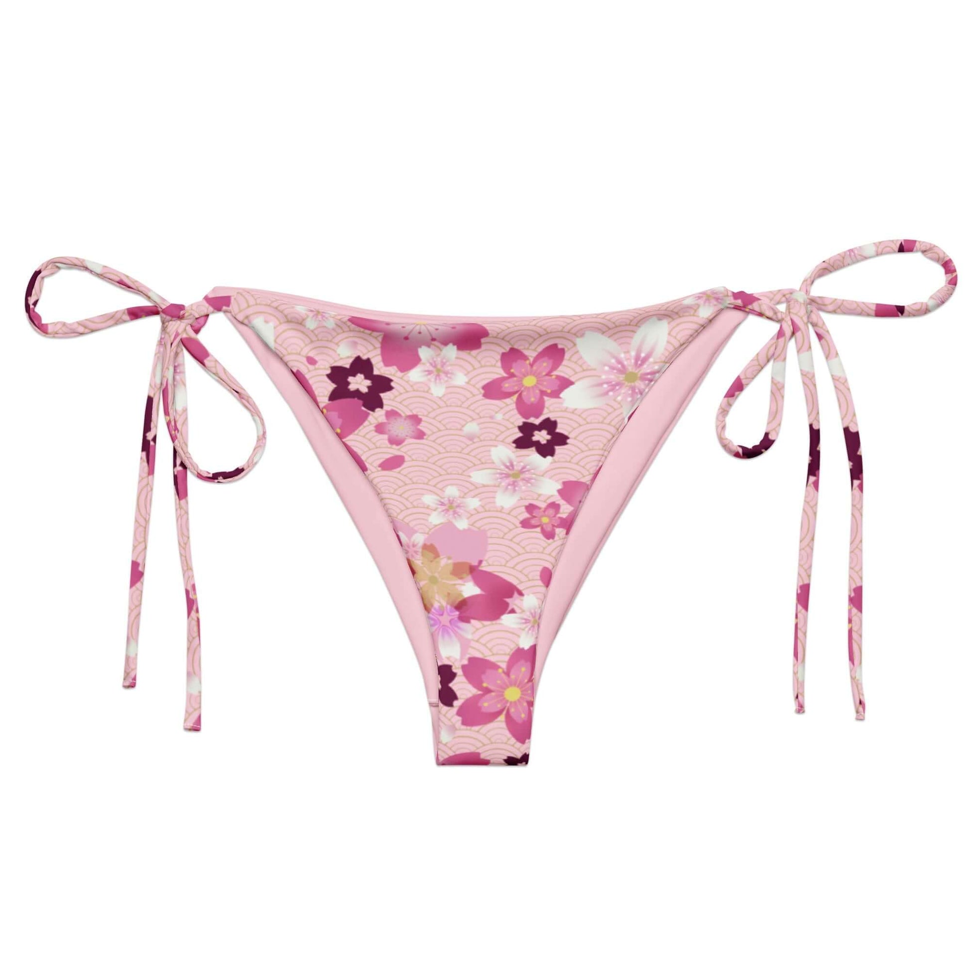 Sakura String Bikini Bottom features a floral design, perfect for sunbathing by the pool this summer.