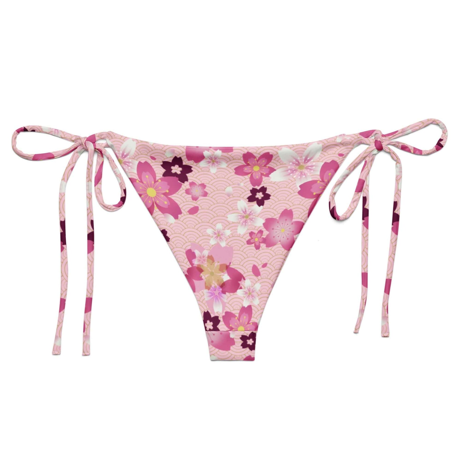 Sakura String Bikini Bottom features a floral design, perfect for sunbathing by the pool this summer.