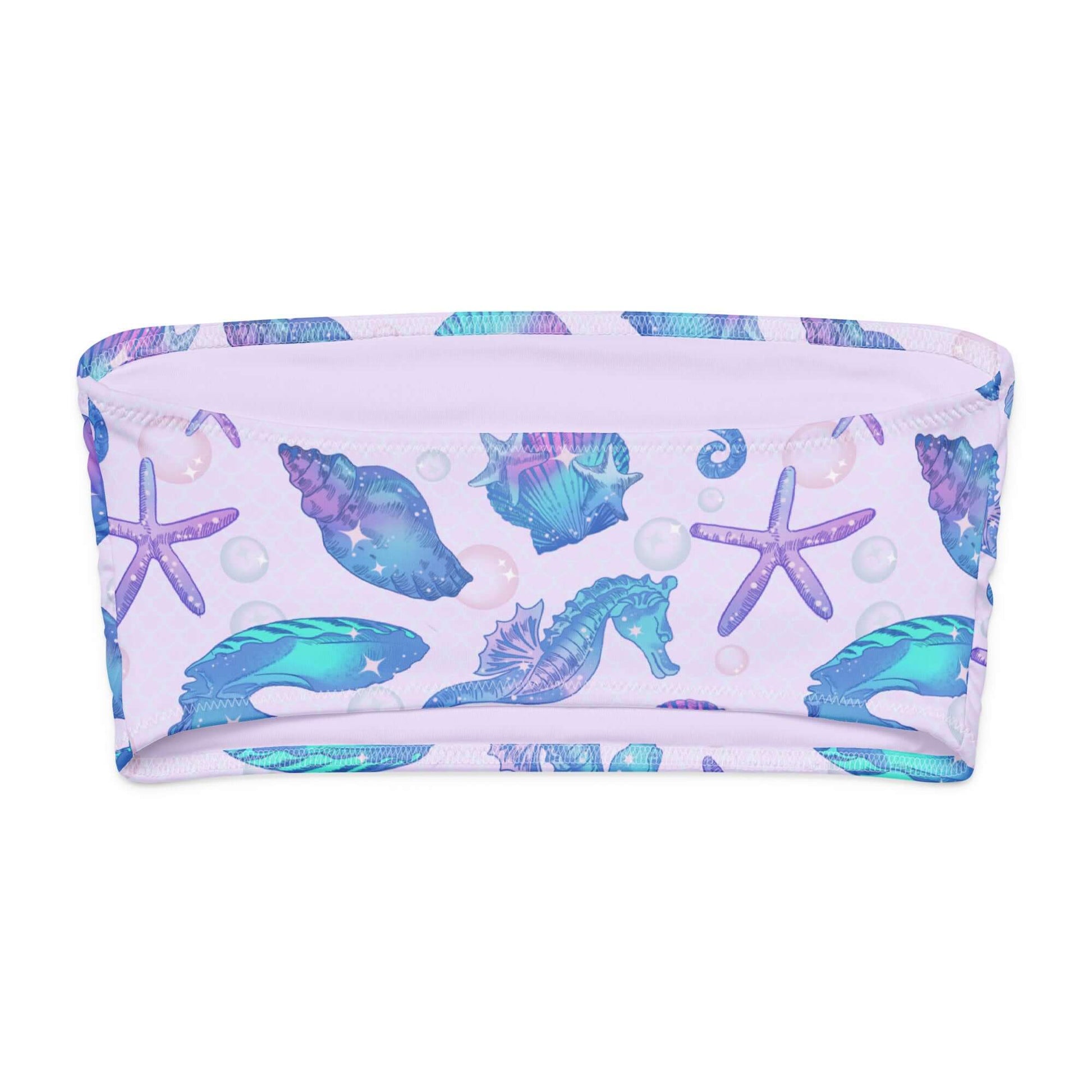 Sea Princess bandeau bikini top featuring colorful seashells, starfish, and seahorses on a soft lavender background.