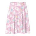 Snow Puppy Skater Skirt features adorable puppies on a pastel pink background, perfect for any fun outfit.
