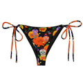 Brightly colored Sugar Skull String Bikini Bottom, perfect for poolside relaxation this summer with UPF 50+ protection.