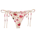 Stylish Sugar Sweetheart String Bikini Bottom featuring a playful print, perfect for summer poolside relaxation.