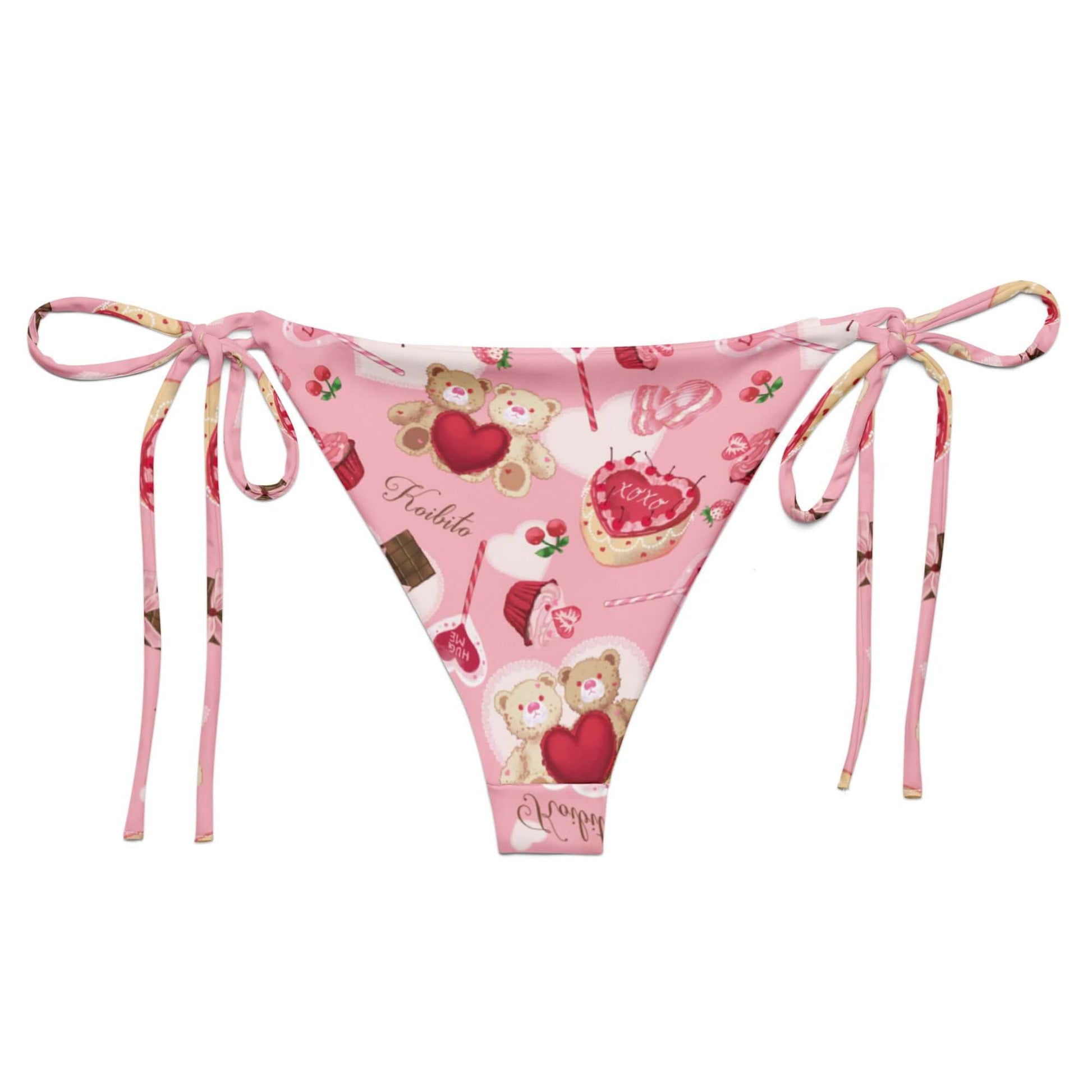 Sugar Sweetheart String Bikini Bottom features a playful design perfect for sunbathing by the pool this summer.