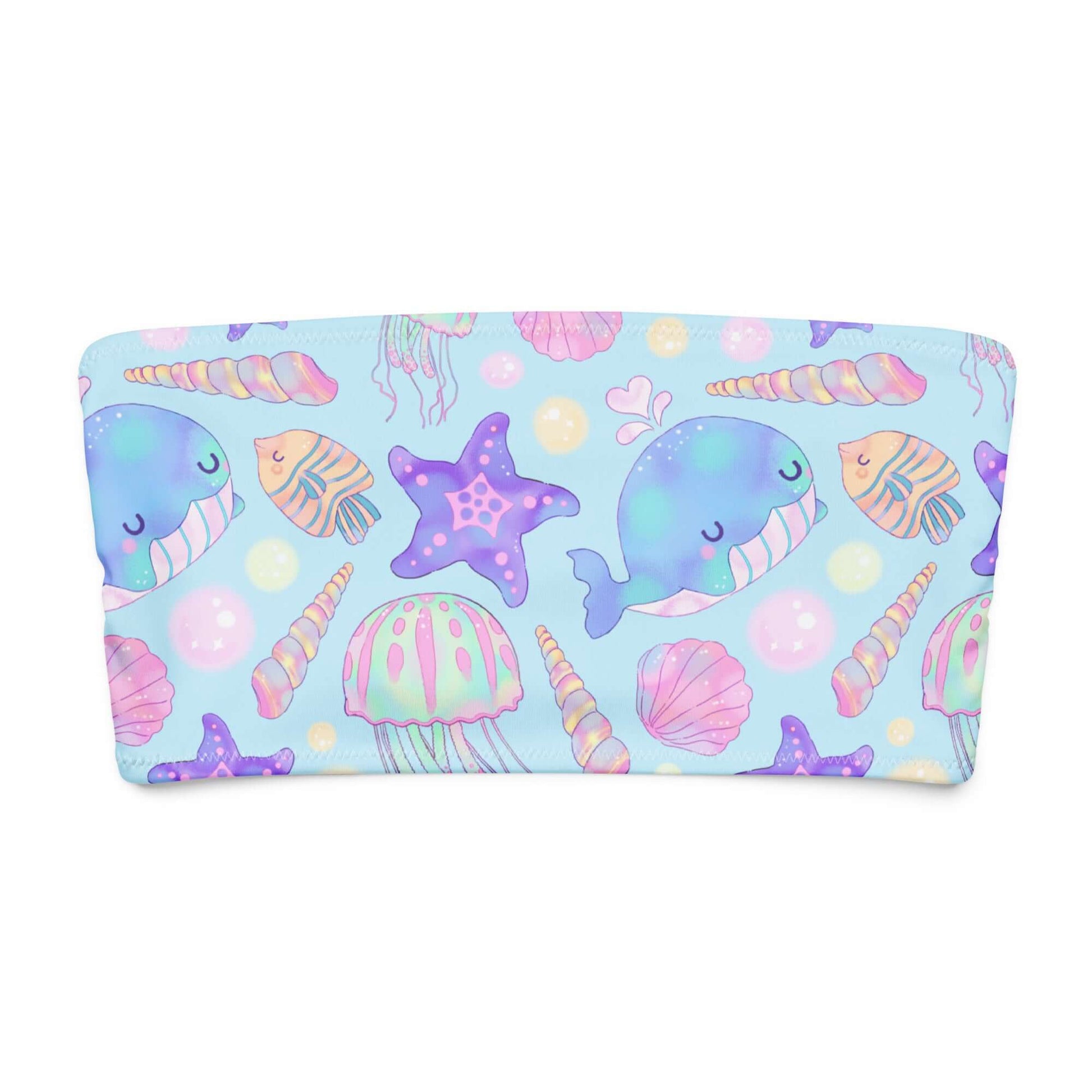 Bright and playful bandeau bikini top design featuring cartoon sea creatures and shells in soft pastel colors.