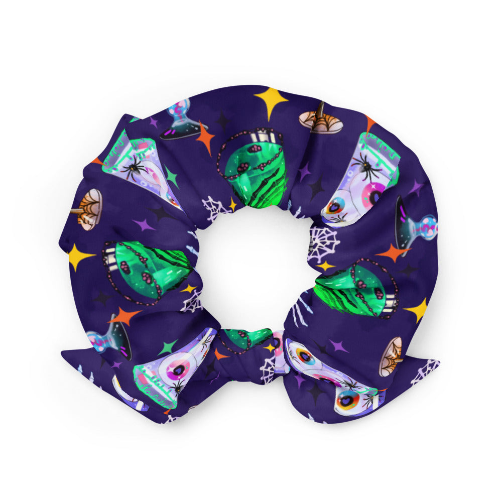 Creepy-cute designs on the Monster Party Scrunchie keep your hair stylish and secure for any festive occasion.