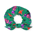 Creepy-cute Monster Party Scrunchie in vibrant green, perfect for completing your look and keeping hair in check!