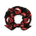 Stylish Enchanted Rose Scrunchie featuring vibrant floral design, perfect for any aesthetic or wardrobe.