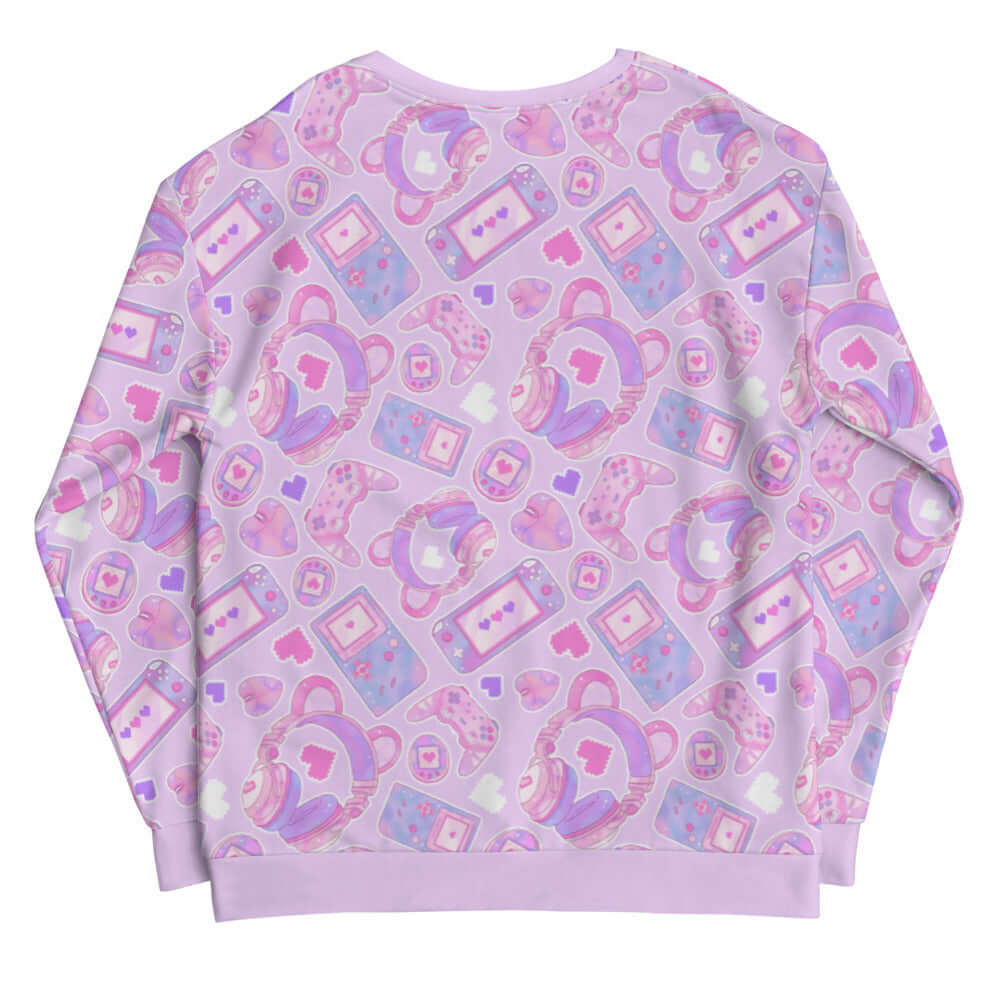 Gamer Girl Sweatshirt featuring pastel consoles and 8-bit hearts, perfect for gaming enthusiasts and stylish comfort.