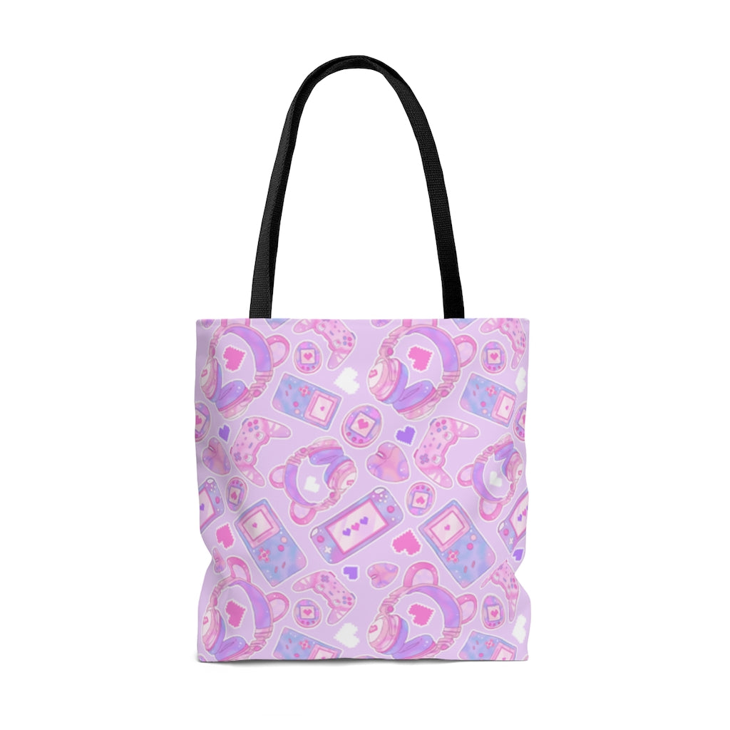Kawaii Gamer Girl Tote Bag (Pink) features gaming icons, perfect for carrying your gear in style and comfort.