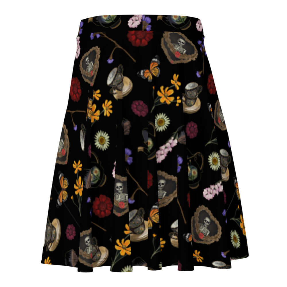 Flattering Gothic Tea Time Skater Skirt featuring a unique floral and skull print, perfect for any stylish occasion.