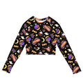 Colorful Halloween Treat Long-sleeved Crop Top featuring festive designs, eco-friendly materials for stylish athleisure.