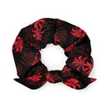 Stylish Higanbana Scrunchie featuring a vibrant floral print, perfect for adding flair to any outfit.