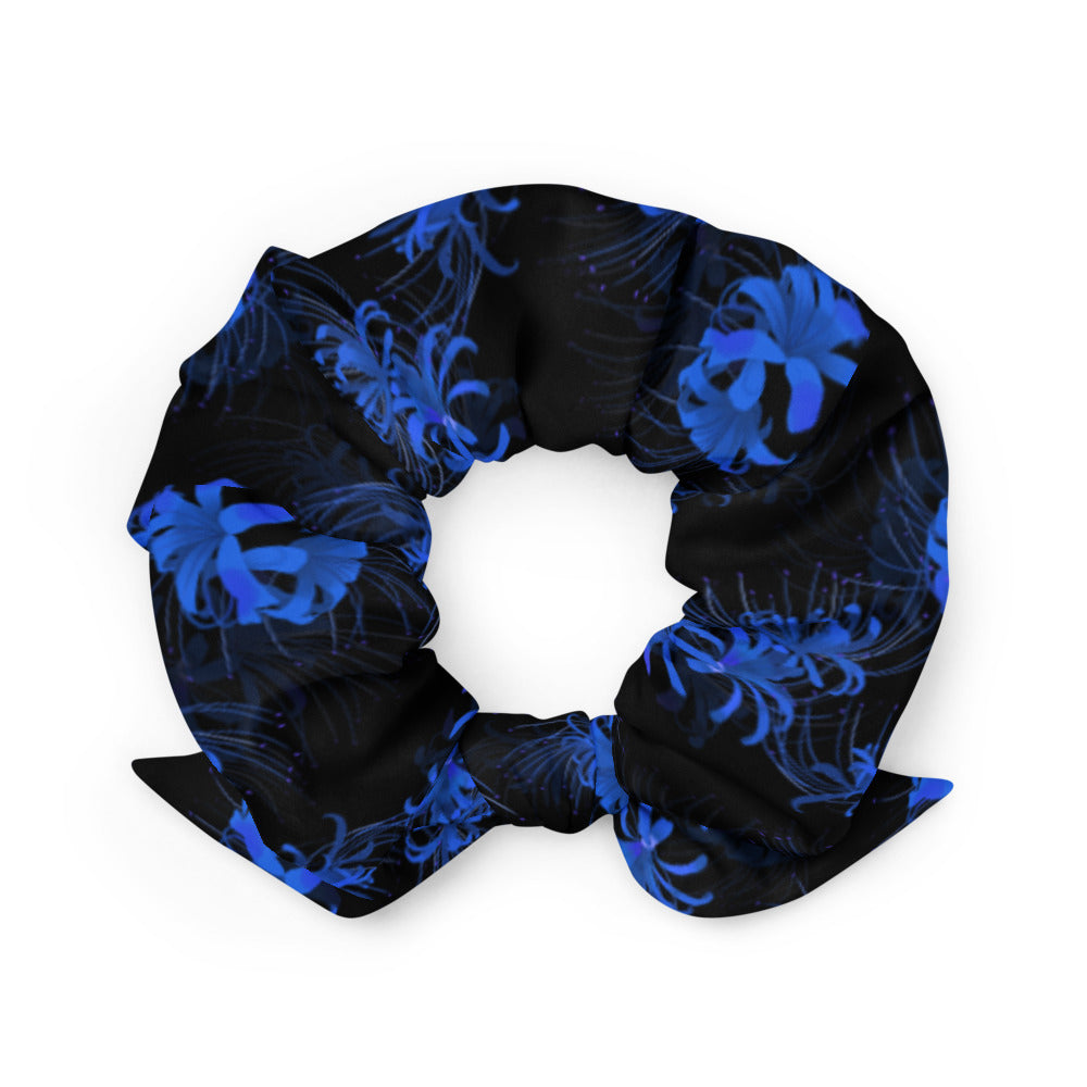 Stylish Higanbana Scrunchie featuring a bold blue floral print, perfect for adding flair to your outfit.