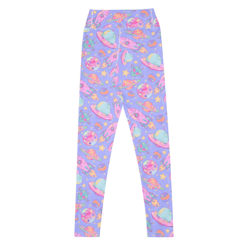 High-waisted Space Leggings feature a vibrant cosmic print, perfect for stylish workouts and casual outings.