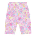 High-waisted Indica Magica Biker Shorts in playful pastel design offer comfort for sun or lounging activities.