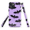 Stylish Morrigan iPhone® Tough Case featuring bats on purple clouds, offering durable protection and trendy design.