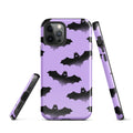 Stylish Morrigan iPhone® Tough Case features a durable design with bats on a purple background for trendy protection.