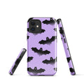 Stylish Morrigan iPhone® Tough Case features bats on a purple background, combining fashion and protection.