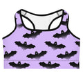 Stylish Morrigan Sports bra featuring a vibrant bat pattern, perfect for motivating workouts and comfort.