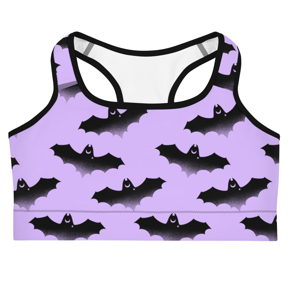 Stylish Morrigan Sports bra featuring a vibrant bat pattern, perfect for motivating workouts and comfort.