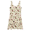 Flirty and fun, the Royal Cookie Skater Dress features an elegant flared skirt with a playful cookie print.