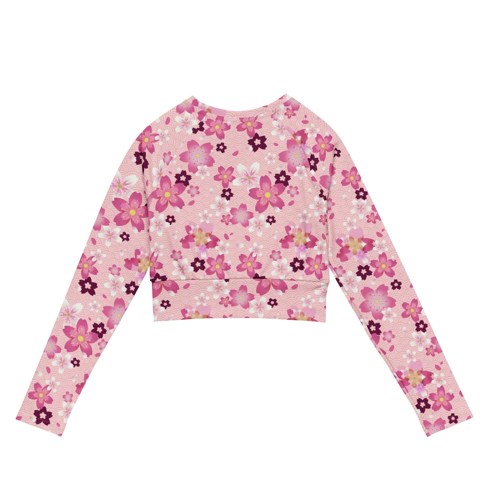 Sakura Long-sleeved Crop Top features a vibrant floral design, perfect for eco-friendly athleisure or casual wear.