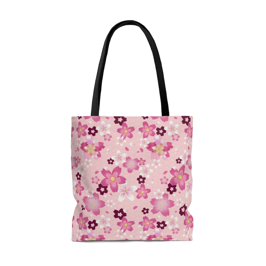 Stylish Sakura Tote Bag (Pink) featuring floral designs, perfect for adding a kawaii touch to any outfit.