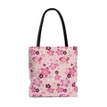 Stylish Sakura Tote Bag (Pink) featuring floral designs, perfect for adding a kawaii touch to any outfit.