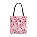 Stylish Sakura Tote Bag (Pink) features vibrant floral design, perfect for adding a kawaii touch to any outfit.