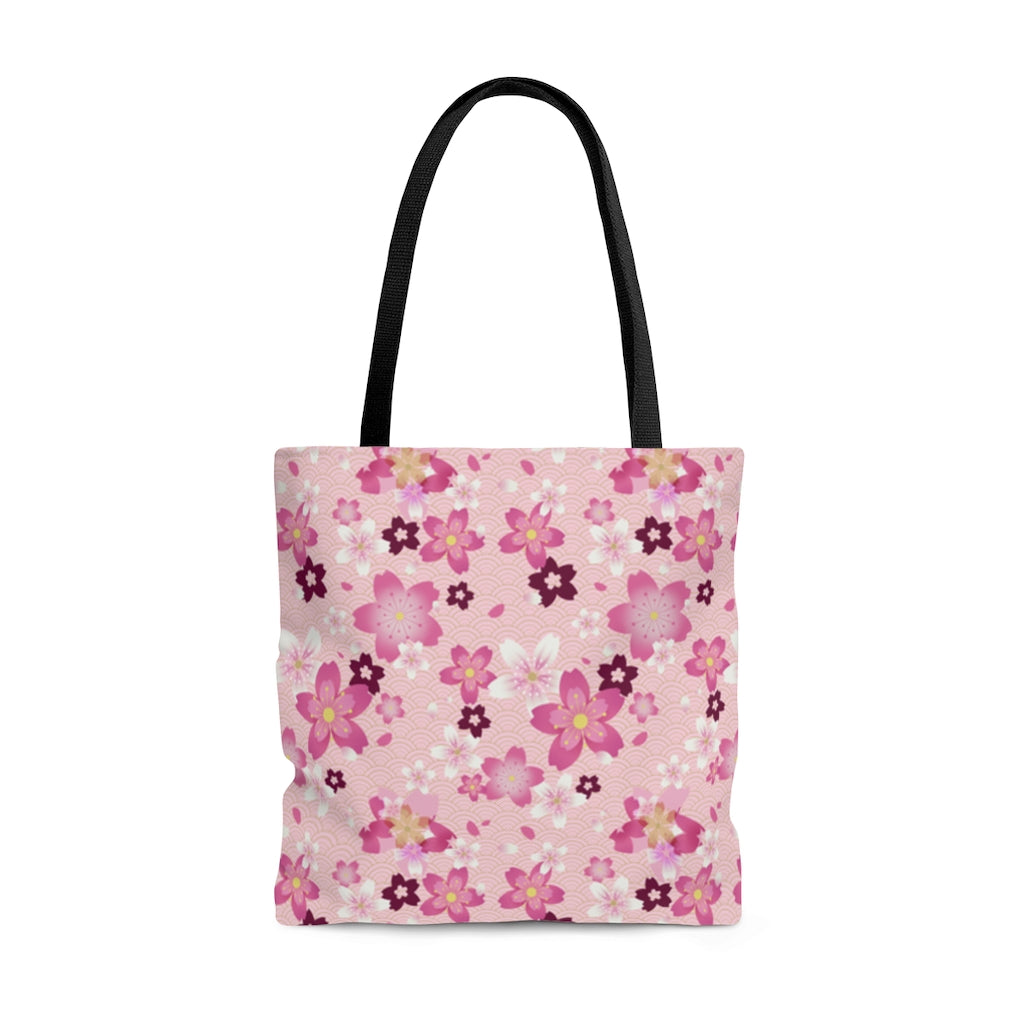 Stylish Sakura Tote Bag (Pink) features vibrant floral design, perfect for adding a kawaii touch to any outfit.