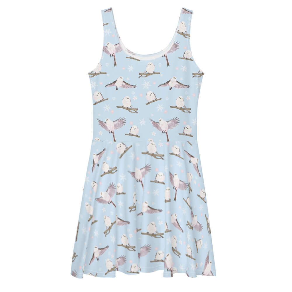 Sleeveless Snow Bird Skater Dress features a pastel bird print, perfect for winter occasions. Soft and stylish!