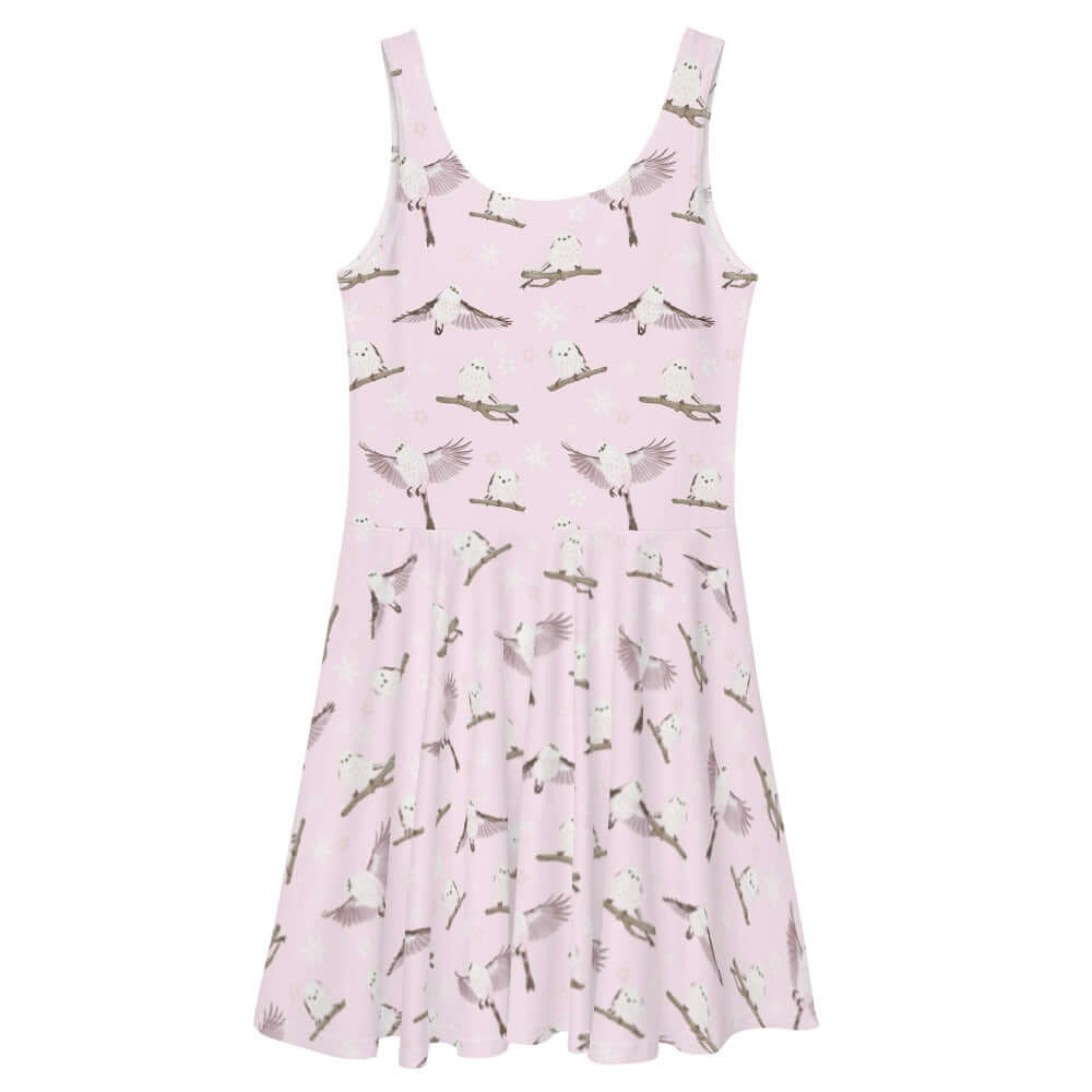 Soft pastel Snow Bird Skater Dress featuring an adorable print and flared skirt, perfect for winter outings.