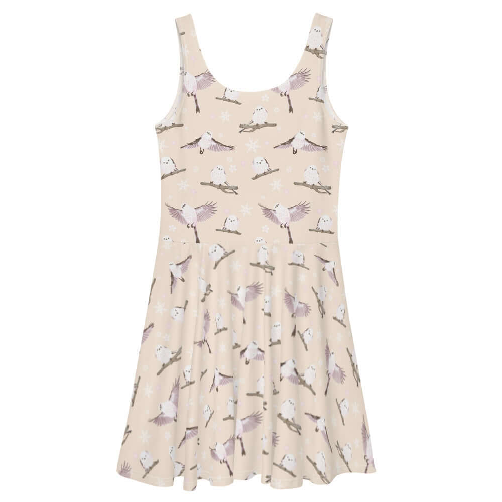Soft pastel Snow Bird Skater Dress featuring an adorable bird print, perfect for winter styling and cozy comfort.