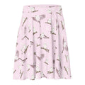 Snow Bird Skater Skirt features a playful pastel design with snowy birds, perfect for winter fashion.