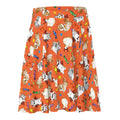 Bright orange Trick or Treaters Skater Skirt features playful pet designs, perfect for Halloween fun and comfy wear.